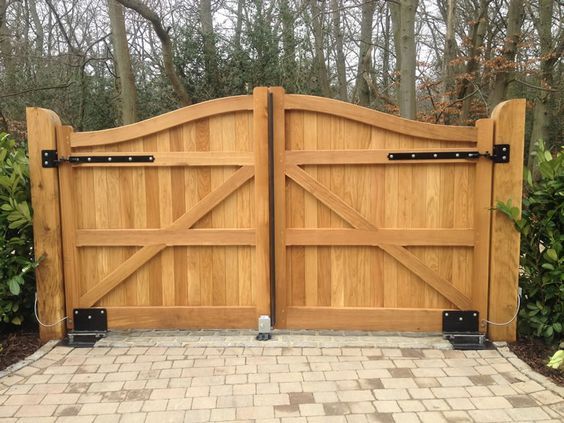 wood gates with black hinges